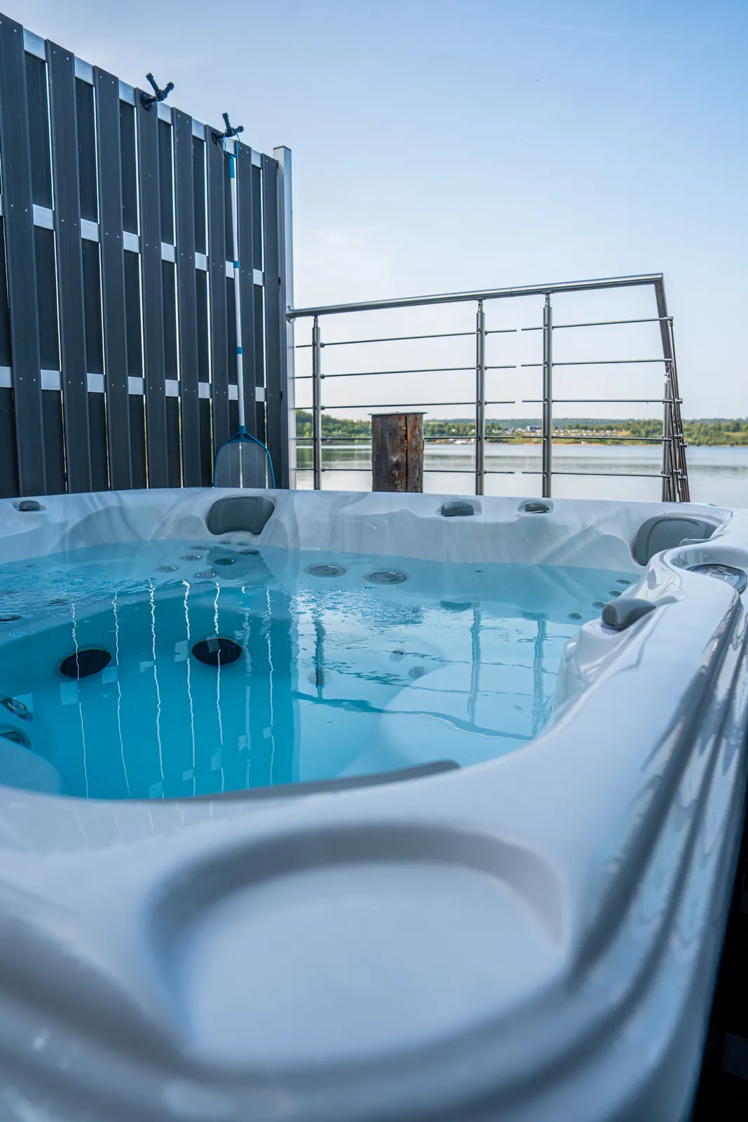 Outdoor hot tub on the terrace overlooking Lake Geiseltalsee