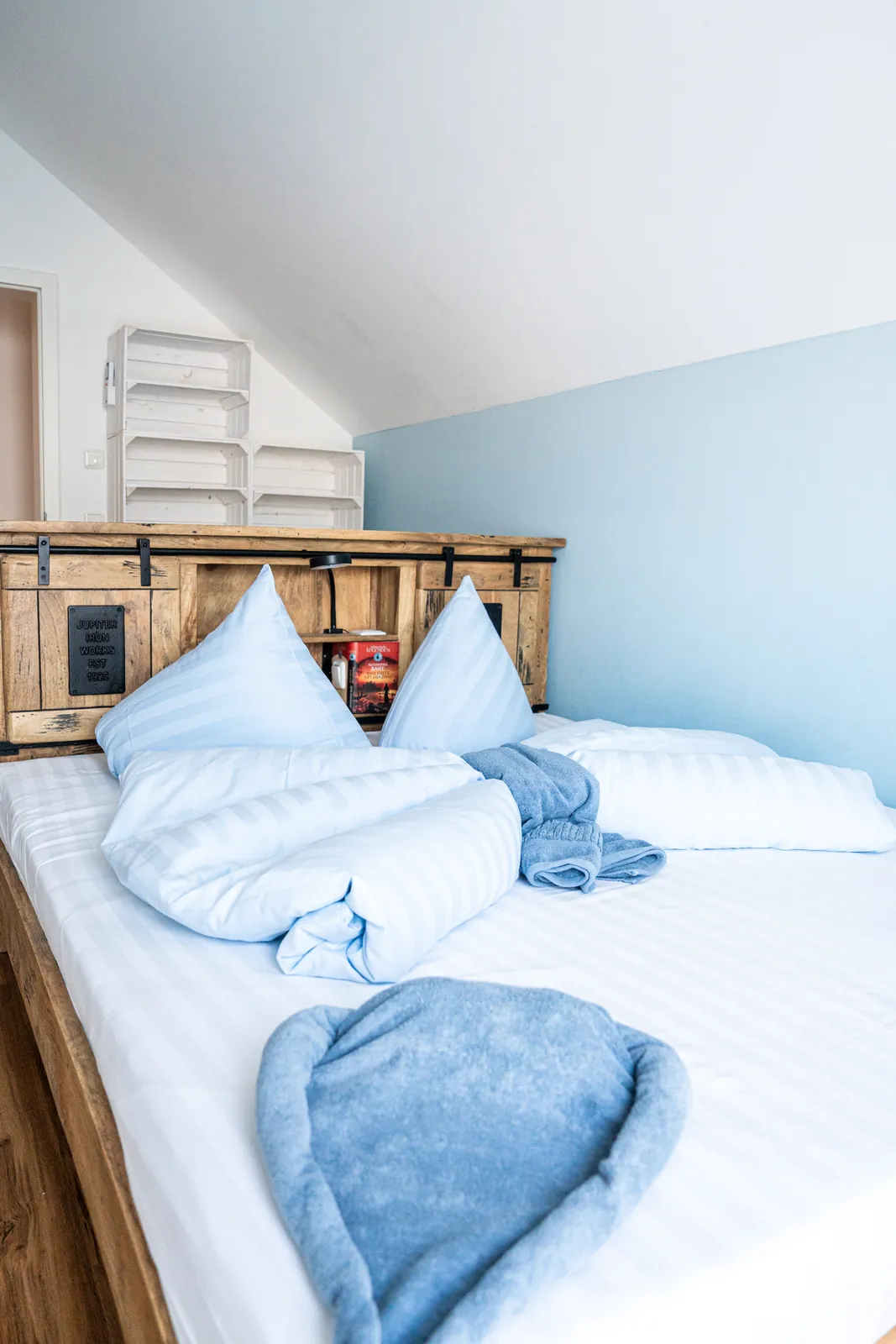 Bedroom with wooden headboard